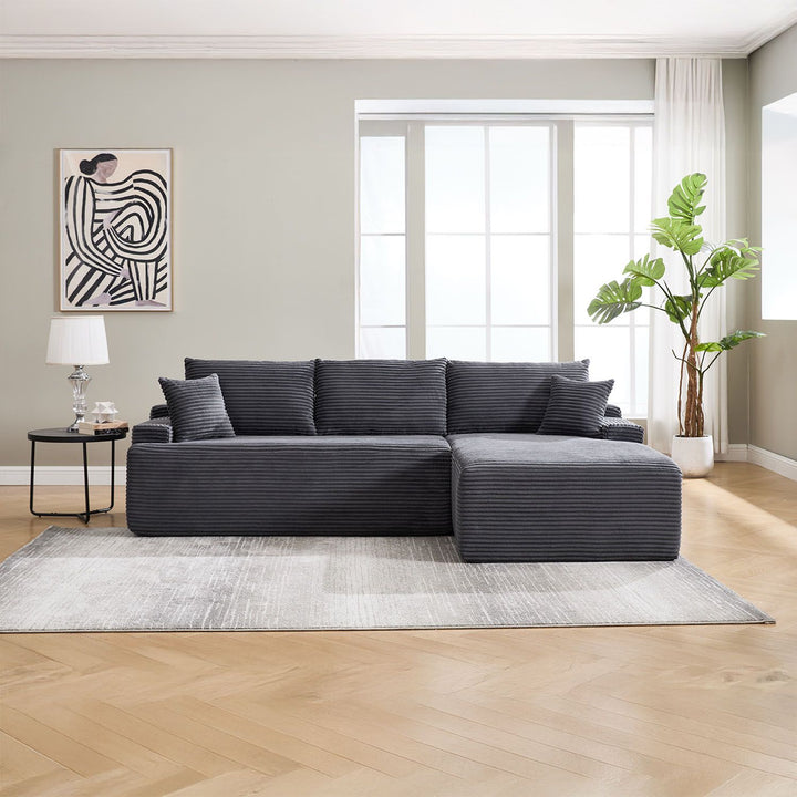 Canapé Coredo avec revêtement en velours côtelé et coussins décoratifs